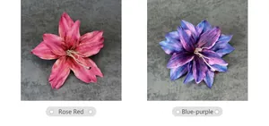 Detailed texture of handmade rose red and blue purple lily artificial flower heads