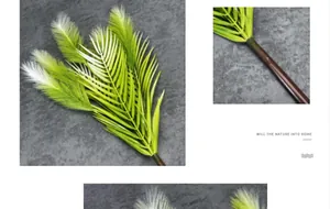 Dettaglio di erba di canna artificiale con fiori soffici e foglie di palma striate