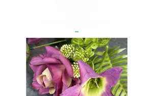 Close-up of artificial silk rose and lily bouquet with realistic purple petals and greenery