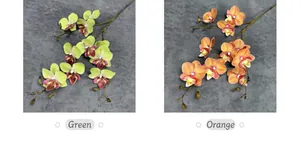 Macro detail of 3D artificial butterfly orchid branches in green and orange colors