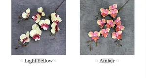 Detailed view of light yellow and amber 3D artificial moth orchids with realistic buds