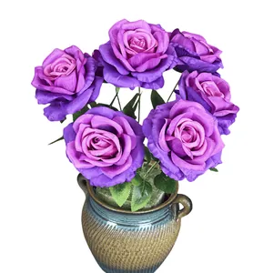 Artificial purple rose bouquet with 7 heads in a vintage brown ceramic vase for decor