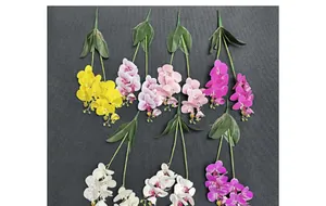 Detail of vibrant PU artificial phalaenopsis orchids in assorted colors for home decoration