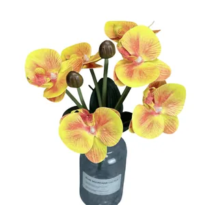 Orquídea amarilla realista impresa en 3D en jarrón de cristal azul grisáceo para hogar