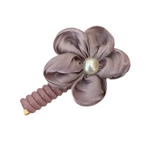 Elegant mauve satin flower hair ring with center pearl and durable spiral elastic band