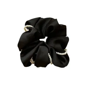Elegant large black satin scrunchie with white pearl wrap design for women