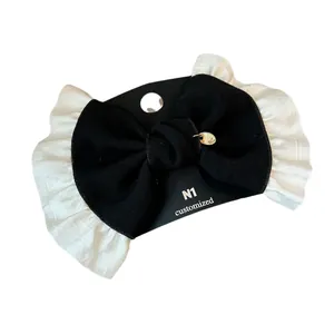 French vintage black and white bow hair clip with lace trim and gold pendant