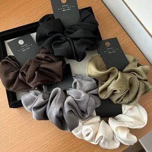 Set of 5 vintage satin scrunchies in neutral tones like olive green and coffee brown