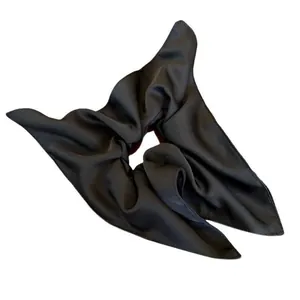 Classic black satin scrunchie with long scarf streamers for a vintage elegant hairstyle