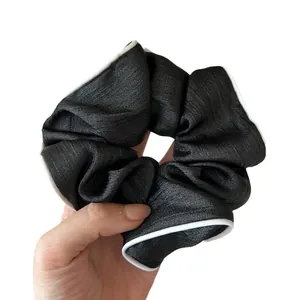 Chouchou vintage français noir avec bordure blanche et texture satinée pour femmes