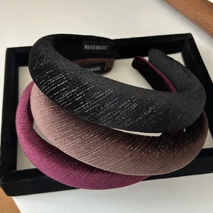 Sparkling velvet padded headband in black, brown, and purple with fine shimmer texture