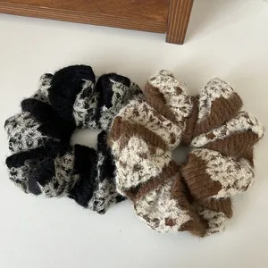 Soft knit scrunchies in plaid pattern and faux mink fur for autumn winter hair styling