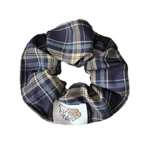 Retro navy plaid scrunchie with cute cartoon bear label for ponytail styling