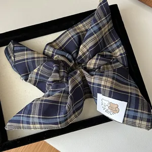 Navy and beige plaid scrunchie with cute bear woven label in preppy style