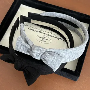 Set di cerchietti a fiocco in maglia retrò nero e grigio con trama a costine