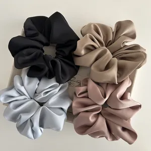 Elegant 4-piece satin scrunchie set in black, khaki, silver and pink tones