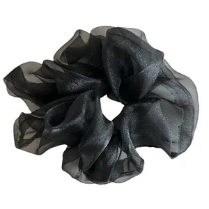 Elegant large black organza scrunchie with shimmering translucent pleated fabric