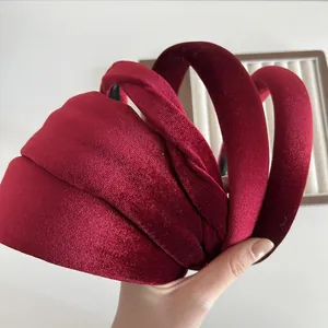 Elegant wine red velvet padded headbands in various styles for a vintage festive look