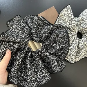 Floral chiffon large scrunchies in black and white set with elegant ruffled edges