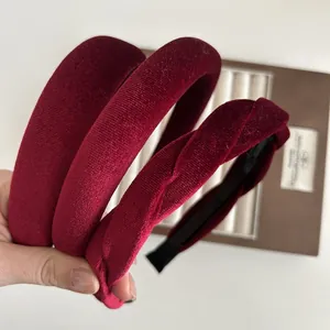 Three-piece set of deep wine red velvet headbands featuring knotted and padded designs
