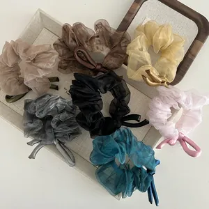 Elegant organza scrunchies with satin bows in Morandi colors for ponytail hair styling