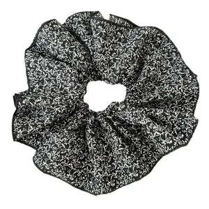 Floral chiffon double-layered oversized scrunchie in black and white pattern