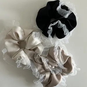 French vintage ruffled organza hair scrunchies in black, cream, and champagne colors