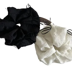 Elegant oversized pleated chiffon scrunchies set with ribbons in black and white