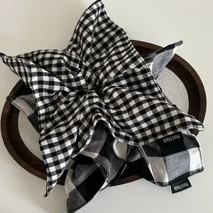 Retro black and white checkered fabric scrunchie hair accessory with Hand Made label