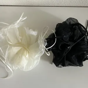 French organza scrunchies set with lace edges and ribbons in black and cream