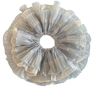 Oversized light blue layered chiffon scrunchie with yellow wavy edges and pleats
