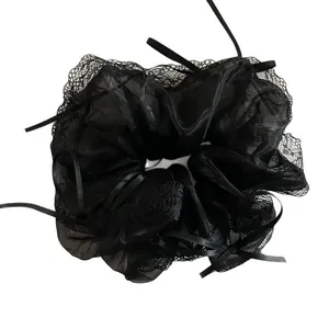 French style black lace scrunchie with organza layers and delicate ribbon bow detail