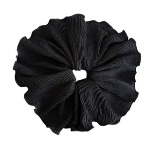 Chic black pleated chiffon oversized scrunchie with soft ruffled texture hair tie