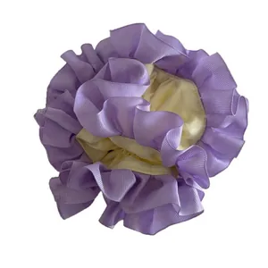 Scrunchie floreale a contrasto in nastro grosgrain viola e tessuto satinato giallo
