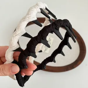 Black and cream wavy twisted headbands with non-slip teeth for high skull top styling