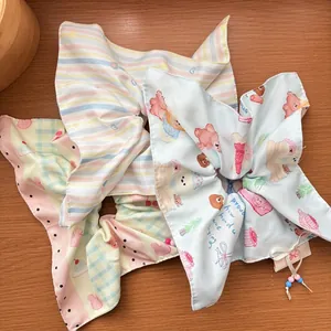 Cute bow tie hair scrunchies with bunny and bear prints on striped fabric with beads