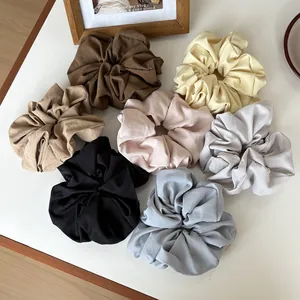 Set of 7 matte cream texture hair scrunchies in minimalist earth tones for women