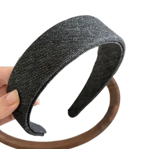 Dark gray denim textured thick headband with silver glitter detail in high crown style