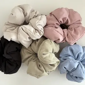 Morandi color scrunchies set in soft matte fabric for elegant hair styling