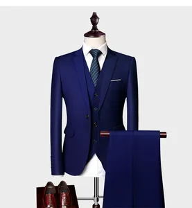 Navy blue slim fit men's three-piece suit with blazer, vest, and trousers on mannequin
