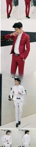 Close-up detail of slim fit single button suits in vibrant red and classic white colors