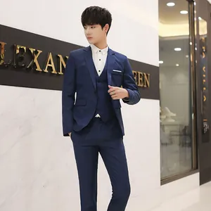 Slim fit dark blue three-piece suit with blazer, vest and trousers for formal business wear