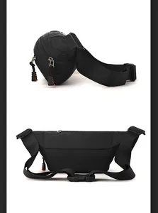 Detail der schwarzen Sport-Bauchtasche mit verstellbarer Schnalle und orangefarbenem Reißverschluss