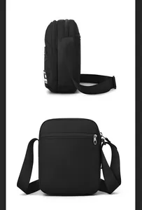 Detailed back view of a black nylon crossbody bag with multiple zip pockets and adjustable strap