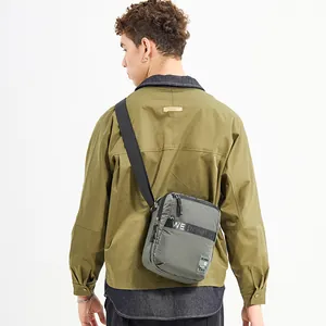 Army green nylon crossbody bag for men with black adjustable strap and WEPOWER print