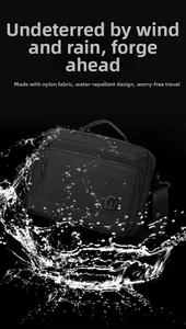Waterproof nylon crossbody bag showing splash resistance test on black background