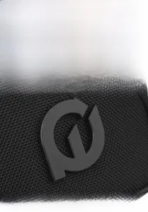 Close-up of black mesh fabric texture and embossed logo on men's crossbody bag