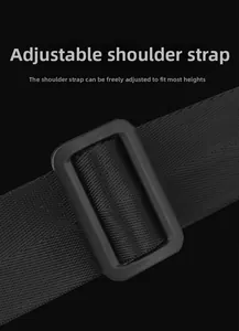 Close-up of durable black nylon adjustable shoulder strap with matte plastic buckle