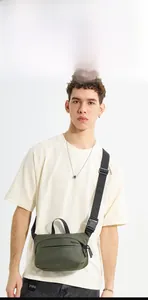 Green nylon chest bag with Wepower logo featuring black webbing handle and wide strap
