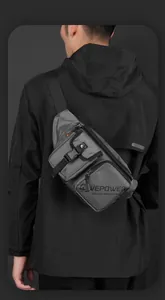 Close-up of lightweight water-resistant tactical chest bag with adjustable strap and logo